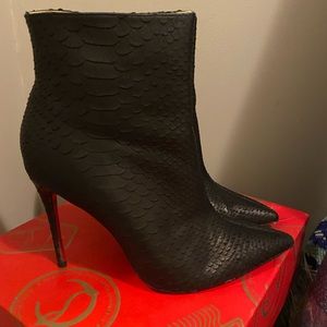 Gently worn Louboutin Booties.